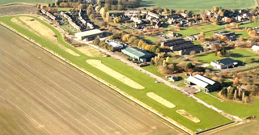 Aircraft and grass airfield at North Coates Flying Club on the Lincolnshire coast